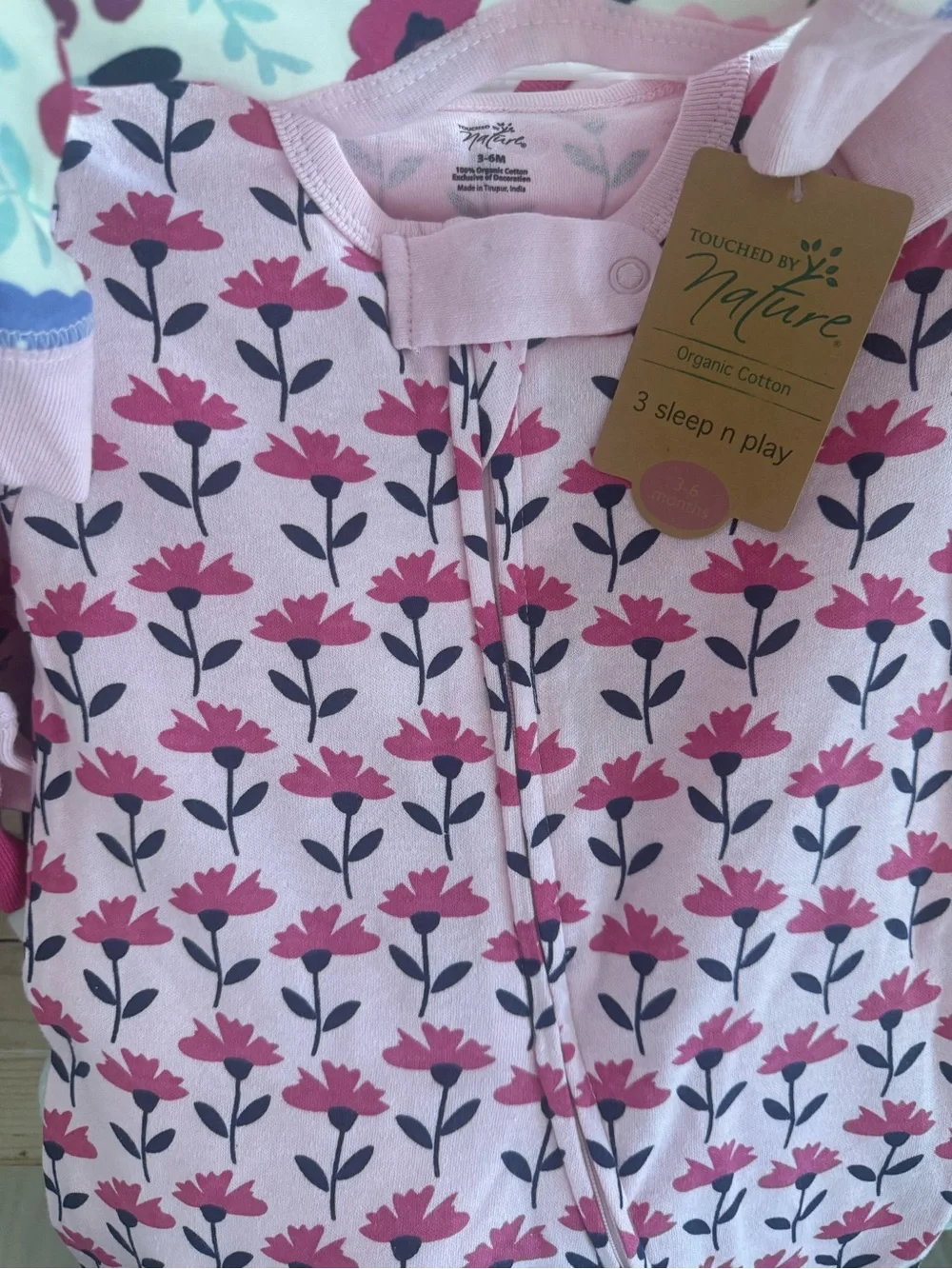 Brand new 3 pack of Pink Floral Baby One-Piece Footed Pajamas
